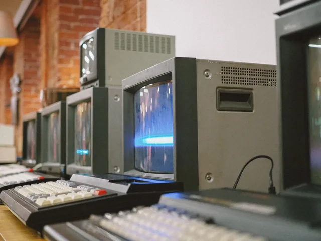 Row of vintage CRT computer monitors showcasing classic technology indoors. 7 lessons worth learning about early social networks statistics