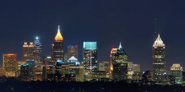 Photoshopped image of Atlanta's skyline. Why does the same meme read differently in Atlanta and rural Texas?